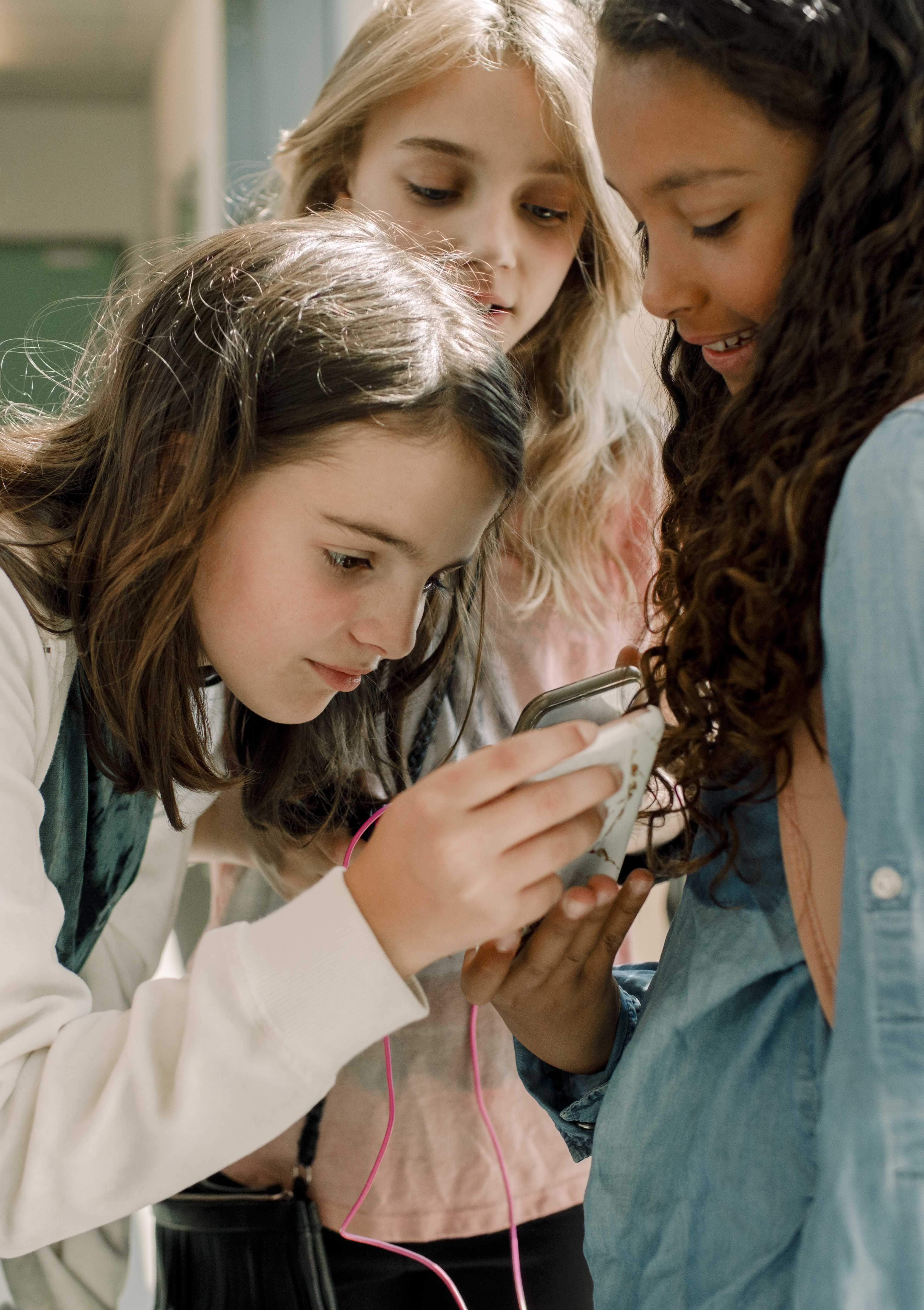 Teens using smartphones